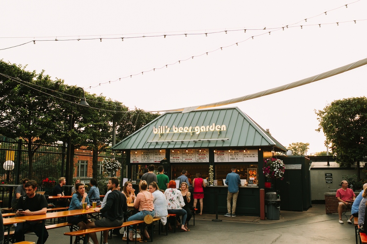 Guests enjoying the summer evening at Bill's Beer Garden in Ann Arbor